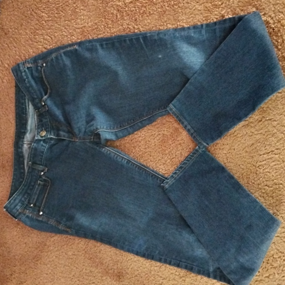 Slim fit ultra low rise blue jeans. Straight leg, size 10R. Women's.